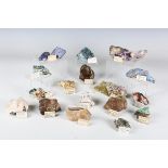 A collection of mineral specimens, including muscovite, hemimorphite, conichalcite, tourmaline and a