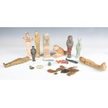 A group of Egyptian reproduction artefacts, including various ushabti models. Note: from the