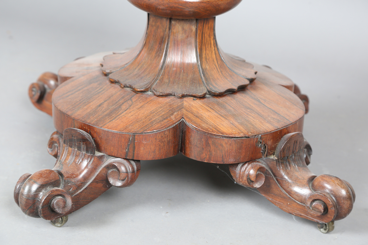 An early Victorian rosewood fold-over tea table, the frieze with applied foliate carved - Image 4 of 11