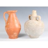 A Roman red ware jug, 2nd-3rd century AD, height 20cm, together with a Roman grey ware twin-