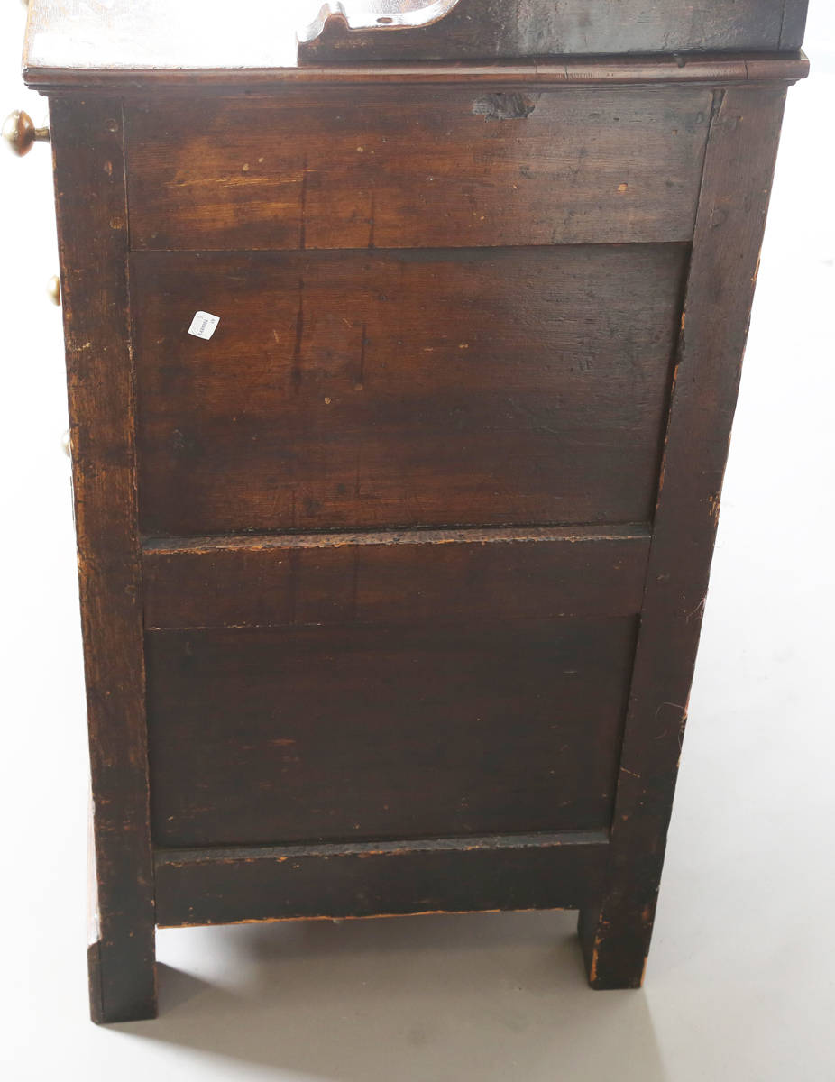 A late George III provincial oak dresser, the shelf back with blue painted backboards, the base with - Image 2 of 9