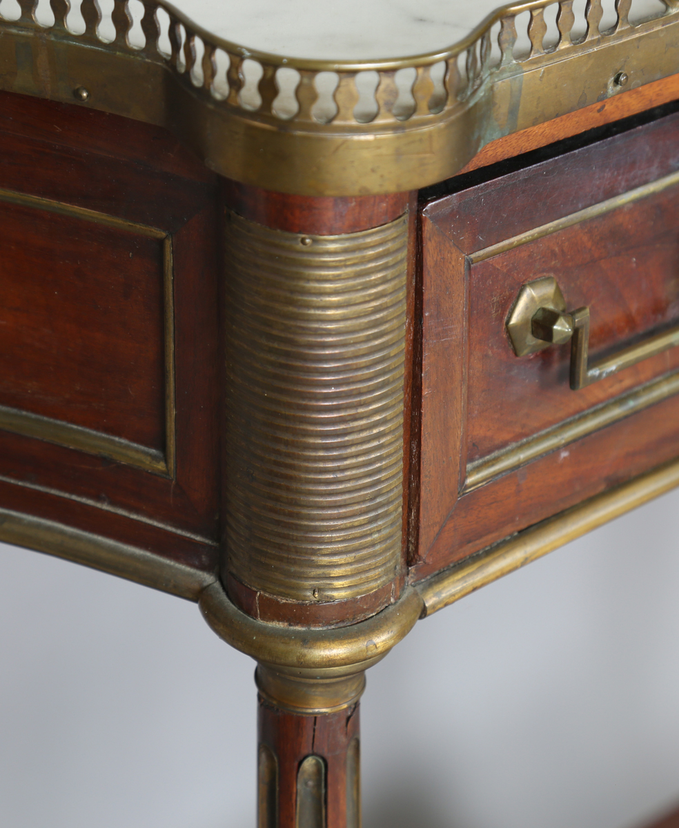 A French Empire mahogany and gilt metal mounted console table, the shaped top inset with white - Image 12 of 20