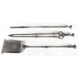 A set of three George III steel fire tools with octagonal facet handles and turned shafts, length of
