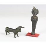 An Egyptian dark patinated bronze figure of Osiris, height 11.5cm, another bronze of Nefertum,