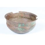 A Roman copper alloy bowl, 2nd-3rd century AD, covered in an overall deep green and brown