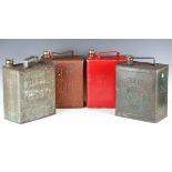 Four vintage metal petrol cans, including Shell-Mex, Shell and Esso, height 32cm.Buyer’s Premium