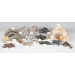 A collection of mineral specimens, including a large section of amethyst, length 20cm, desert