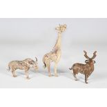 A group of three glass models of a giraffe, buffalo and deer, possibly ancient, bearing