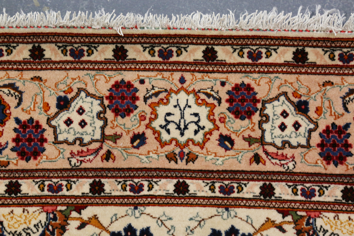 A Tabriz rug, Central Persia, late 20th century, the ivory field with overall scrolling tendrils - Image 3 of 6