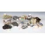 A collection of mineral specimens, including some polished examples, including brecciated jasper,