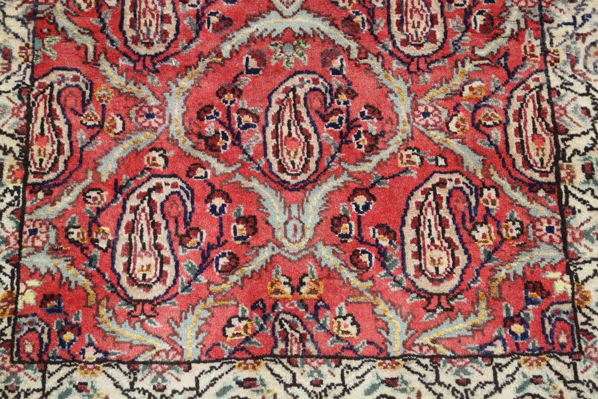 A Tabriz rug, Central Persia, mid/late 20th century, the red field with a boteh lattice, within an - Image 3 of 6