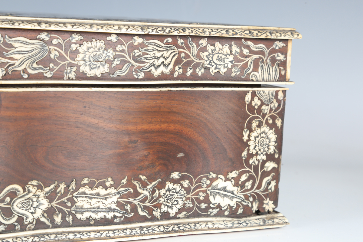 A late 18th century Indo-Portuguese hardwood and ivory inlaid workbox, the serpentine shaped lid - Image 14 of 16