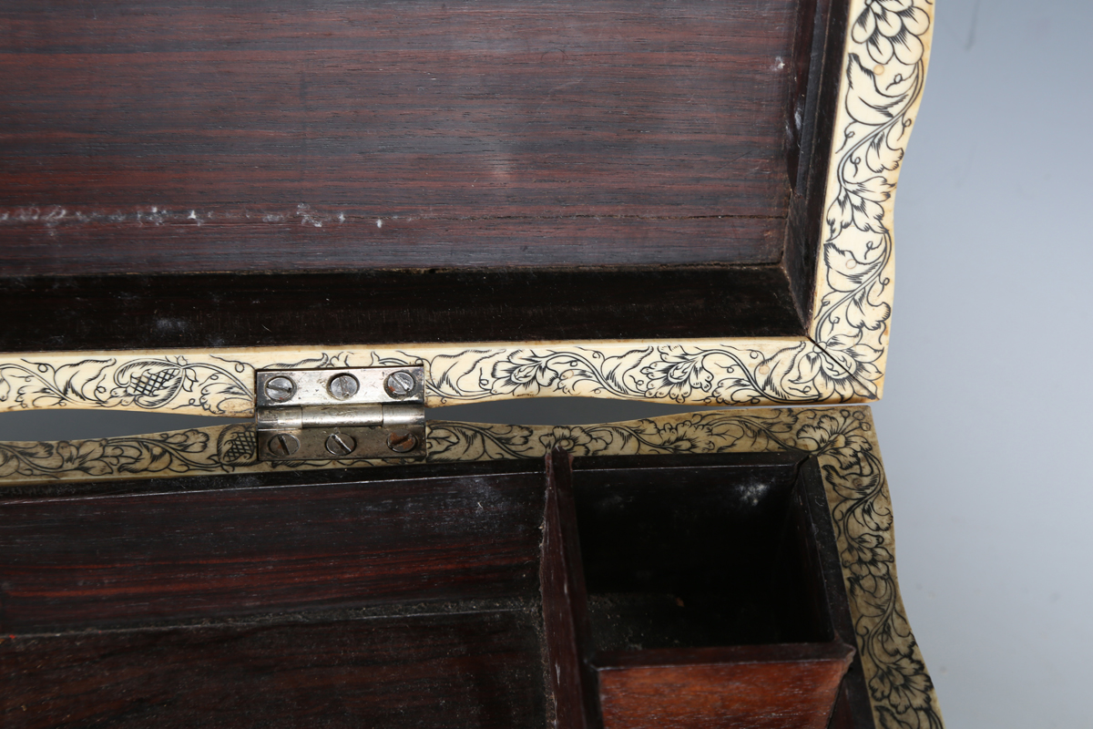 A late 18th century Indo-Portuguese hardwood and ivory inlaid workbox, the serpentine shaped lid - Image 10 of 16