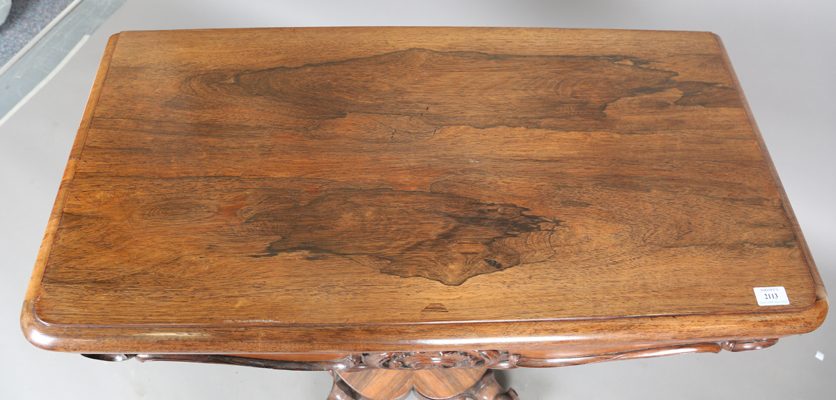 An early Victorian rosewood fold-over tea table, the frieze with applied foliate carved - Image 11 of 11