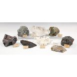 A collection of mineral specimens, including various calcite formations, almandine, length 15cm,