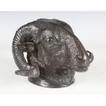 A 20th century brown patinated cast bronze wall mount in the form of a ram's head, height 13.5cm.