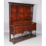 A late George III oak Welsh dresser, the shelf back above five drawers and a pot shelf, height
