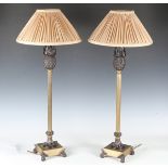 A pair of modern gilt and brown patinated bronze table lamps, each with pineapple finial above a