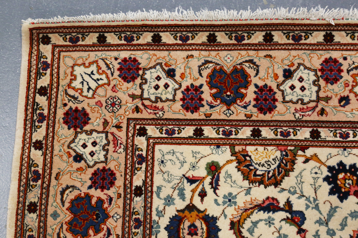 A Tabriz rug, Central Persia, late 20th century, the ivory field with overall scrolling tendrils - Image 4 of 6