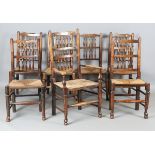 A harlequin set of six late 19th/early 20th century turned ash spindle back chairs with rush