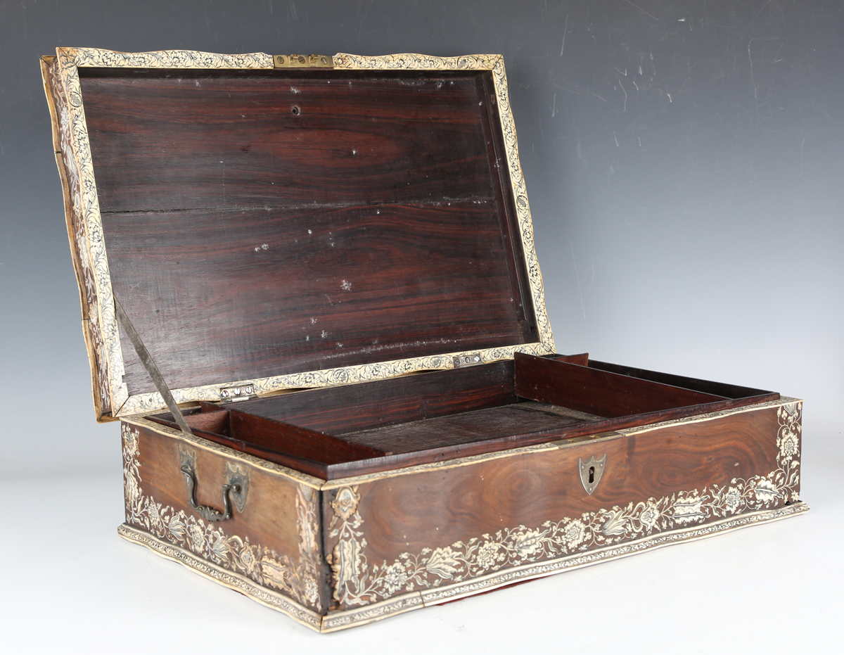 A late 18th century Indo-Portuguese hardwood and ivory inlaid workbox, the serpentine shaped lid - Image 13 of 16