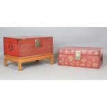 A pair of 20th century Chinese red lacquered vellum trunks, the fronts and sides with gilt