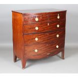A George III mahogany bowfront chest of drawers, height 110cm, width 110cm, depth 57cm.