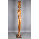 Paul Wunderlich - a late 20th century German carved wooden figure of a nude female with tall