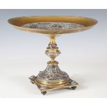 A mid-19th century Elkington style plated copper and brass tazza, the circular dish top decorated in