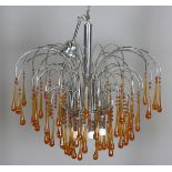 A mid-20th century chromium plated and Murano glass chandelier, the multiple arched arms