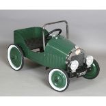 A modern vintage style child's pedal car by Baghera, length 81cm.Buyer’s Premium 29.4% (including