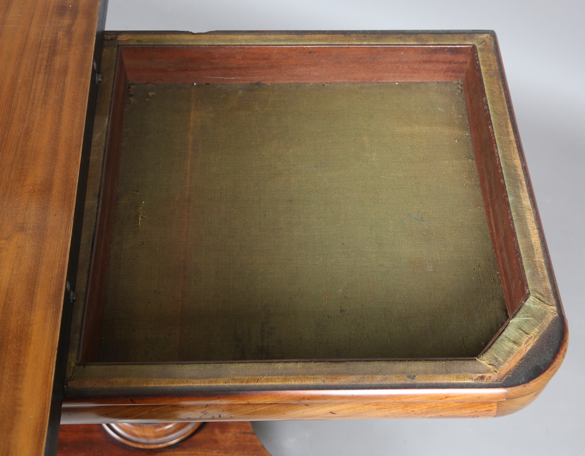 A George IV mahogany fold-over tea table, raised on a turned column and quatrefoil base, height - Image 6 of 9