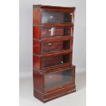 An early 20th century mahogany Globe Wernicke five-tier bookcase with glazed doors, on a plinth