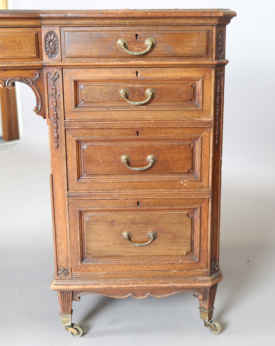 An Edwardian walnut twin pedestal desk by Gillows of Lancaster, the breakfront top inset with - Image 5 of 12