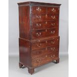 A George III mahogany chest-on-chest, the oak-lined drawers with brass drop handles, fitted with a