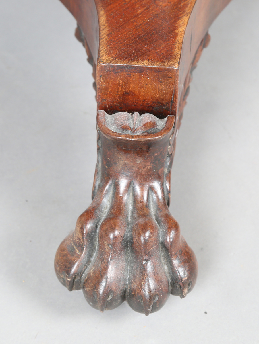 A George IV mahogany fold-over tea table, raised on a turned column and quatrefoil base, height - Image 2 of 9