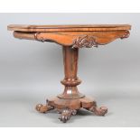 An early Victorian rosewood fold-over tea table, the frieze with applied foliate carved