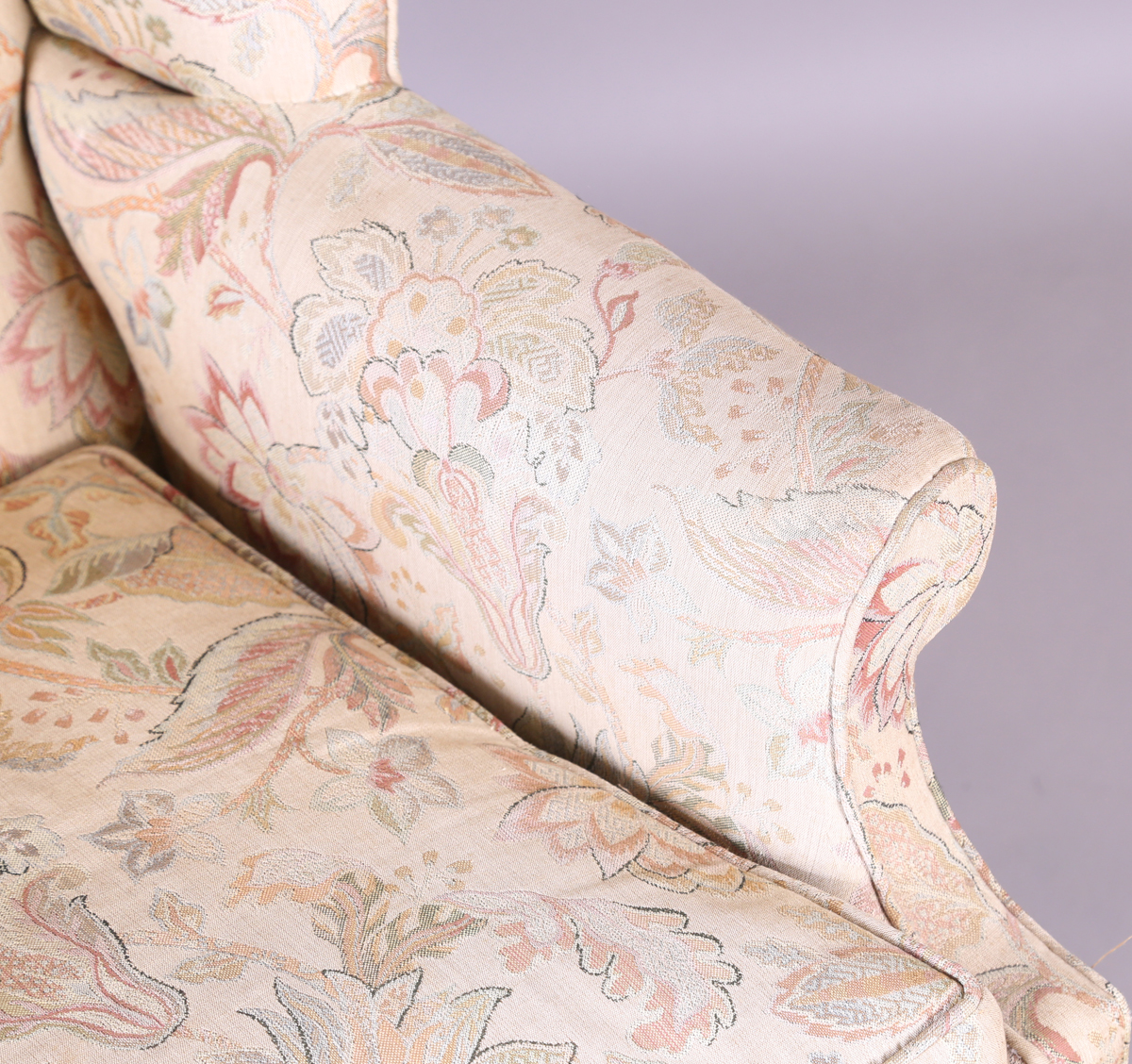 A 20th century George III style wingback armchair, upholstered in foliate machined tapestry style - Image 9 of 12