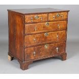 A George I walnut chest of drawers with overall oak crossbanded borders, height 85cm, width 86cm,