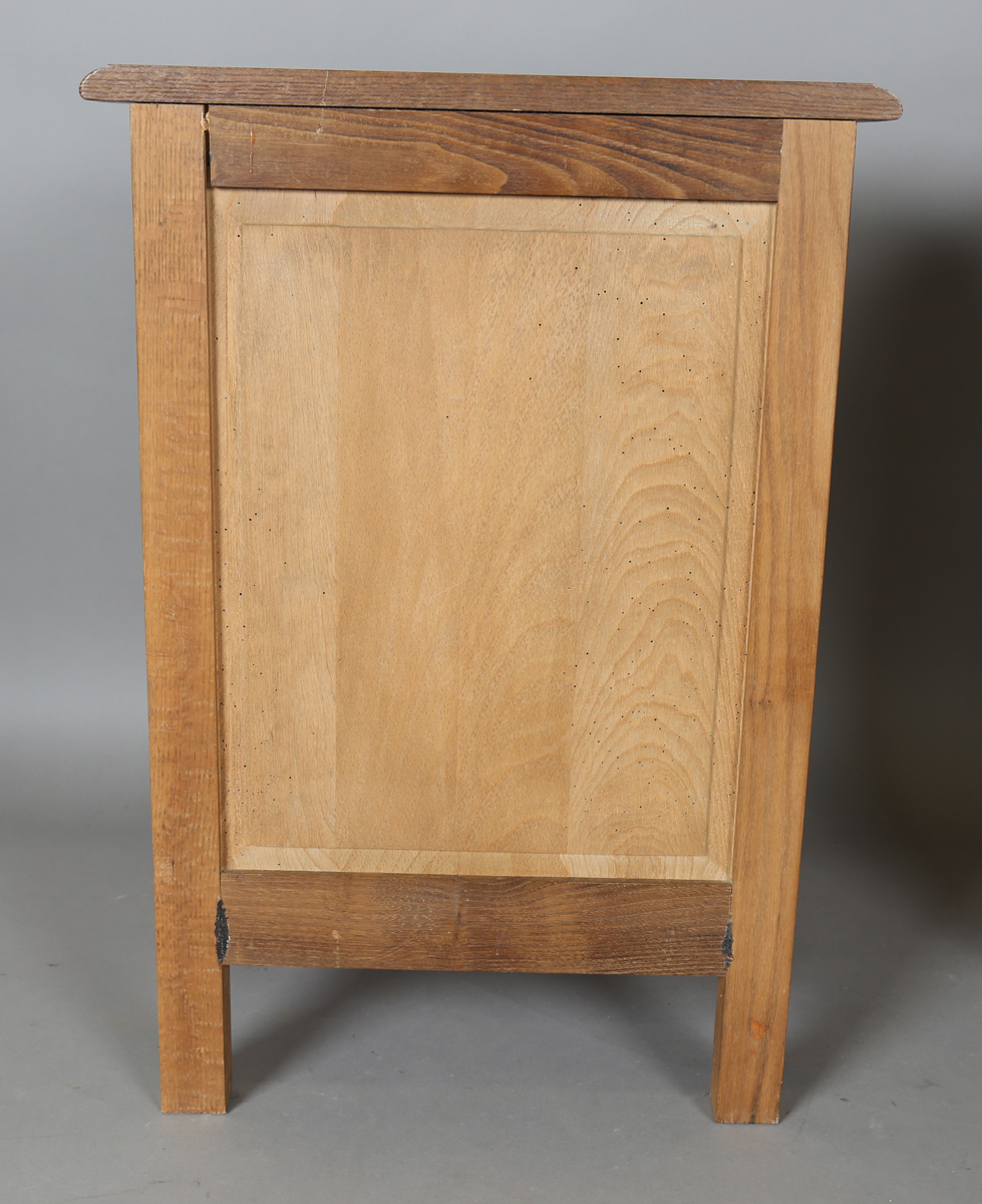 A pair of late 20th century French oak bedside cabinets, each fitted with a finely carved drawer and - Image 12 of 17