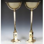 A pair of late 20th century Victorian style gilt brass table lamps, each with an opaque glass