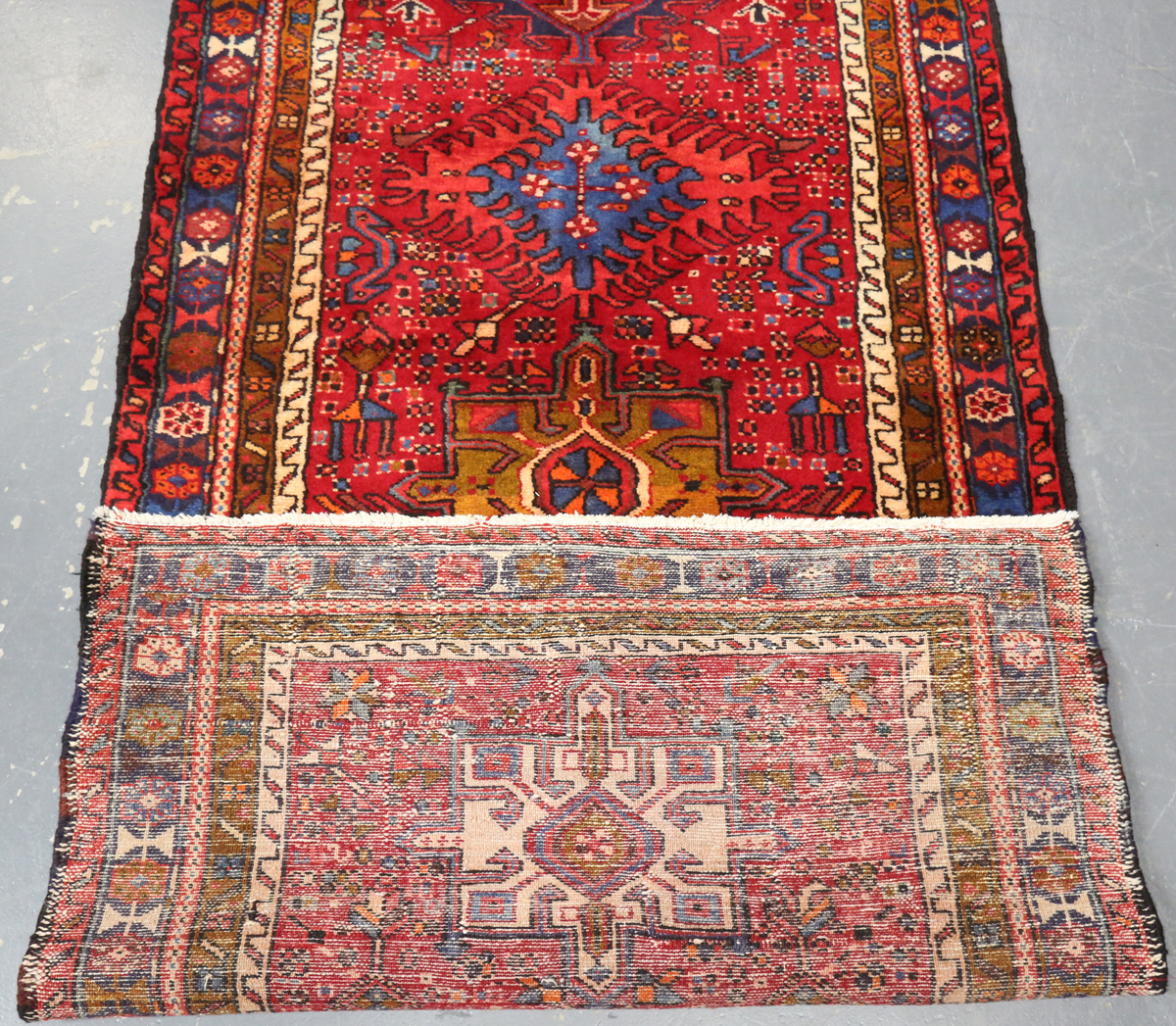 A Heriz runner, North-west Persia, mid/late 20th century, the red field with a column of shaped - Image 2 of 7