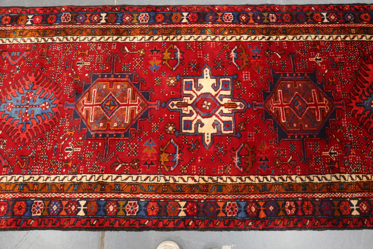 A Heriz runner, North-west Persia, mid/late 20th century, the red field with a column of shaped - Image 5 of 7