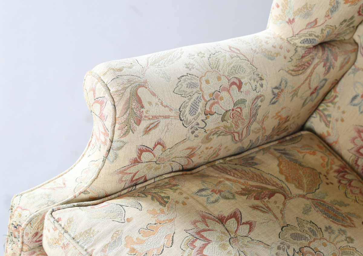 A 20th century George III style wingback armchair, upholstered in foliate machined tapestry style - Image 8 of 12