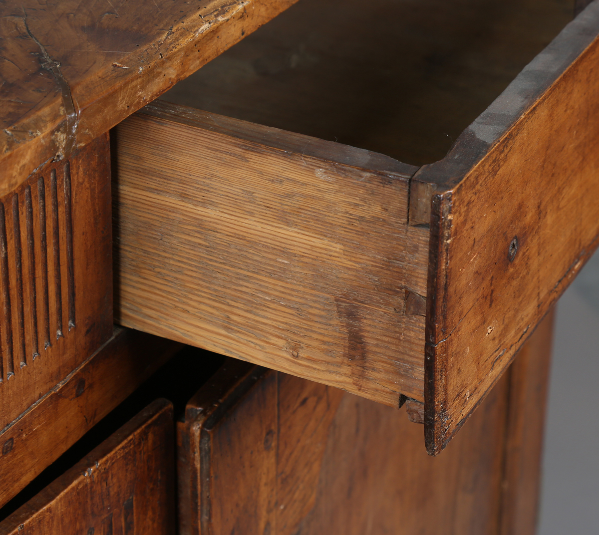 An 18th century French provincial walnut cabinet, fitted with two drawers above panelled doors, - Image 17 of 20