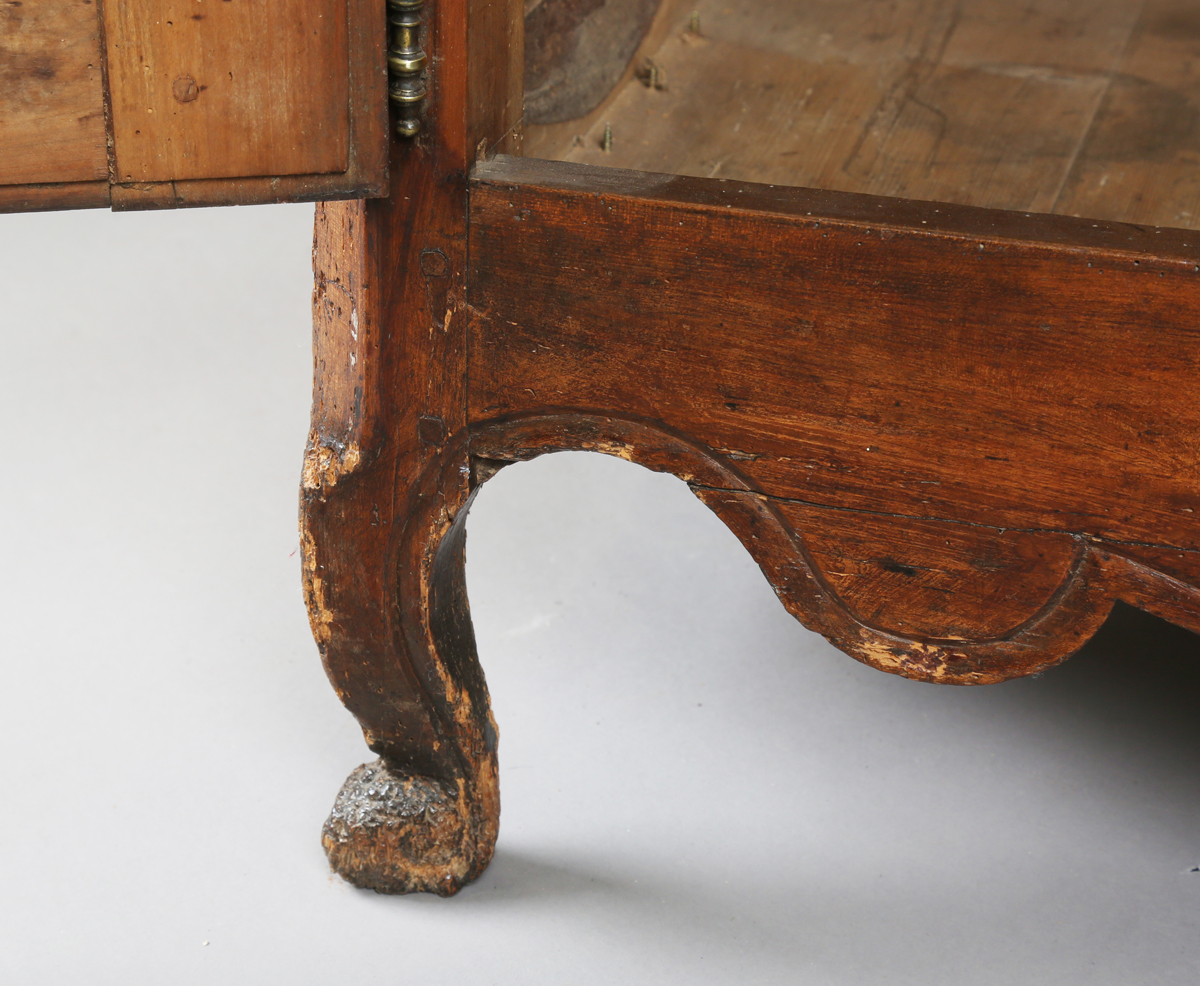 An 18th century French provincial walnut cabinet, fitted with two drawers above panelled doors, - Image 7 of 20