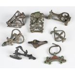 A group of six Continental Roman copper alloy brooches of various designs, including one of axe