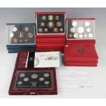 A large collection of Royal Mint year-type specimen coin sets and other commemorative coins.Buyer’