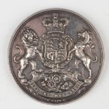 An early 19th century silver stockbroker's medal by John Milton, engraved 'William Thomas Pittman'.
