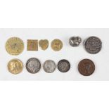 A collection of diminutive coins and medallions, including an Edward VII Maundy penny 1903, a George